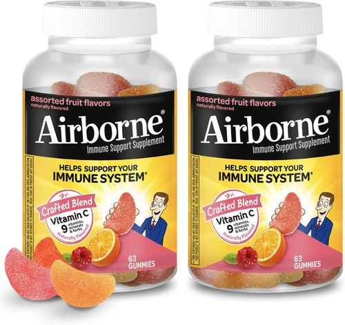 Two bottles of Airborne immune support gummies on a white background